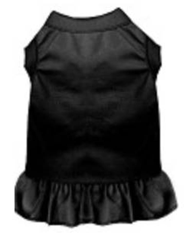 May include: Black sleeveless dog dress with a ruffled hem.