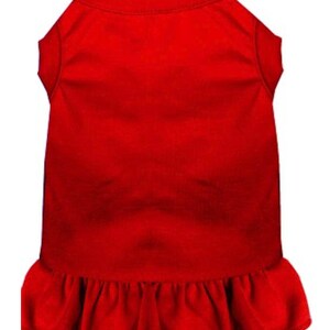 May include: A red dog dress with a ruffled hem.