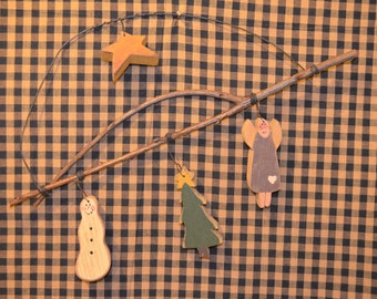 Painted Country style wooden Christmas wall hanging with a Snowman, Christmas tree, star, and an Angel hanging down