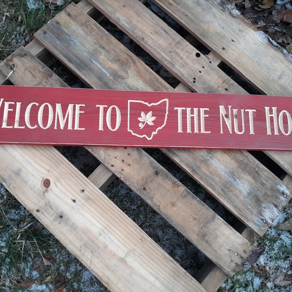 Welcome To The Nut House Ohio State Wood Sign  36"x 5 1/2" Engraved & Routered To show Natural Wood Color Through The Hand Painted Red Color