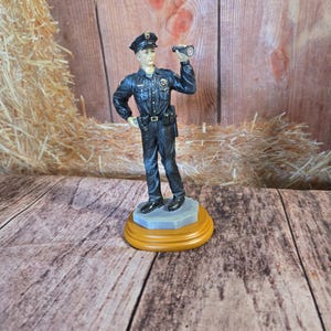 Police officer Holding a Flashlight 3D Resin Decorative figurine