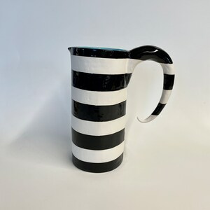 tall ceramic Pitcher black & white stripes w/ whimsical handle