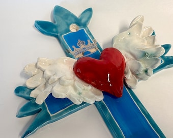 whimsical pottery Cross with large winged heart, turquoise & bright blue with gold crown decal