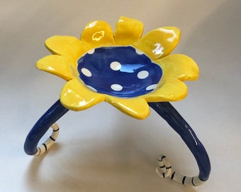 Alice in Wonderland Pottery Dish -- Blue, yellow w/ long curly black & white striped legs, polka dots