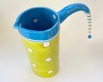 Bright chartreuse ceramic Pitcher w/ bright blue & whimsical handle