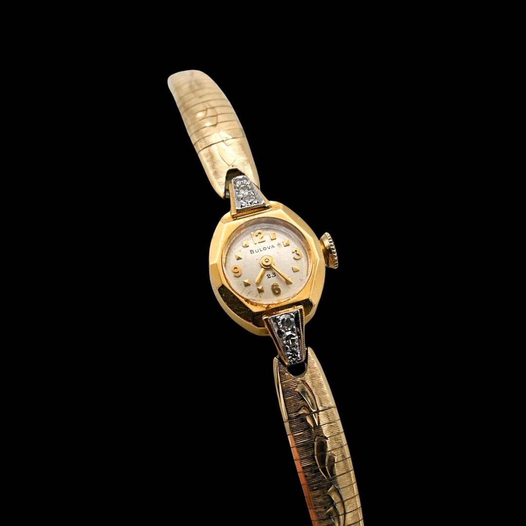 【BULOVA】ブローバ/レディース腕時計/お洒落/ゴールド色/高級/女性用 高貴】BULOVA/ブローバ/レディース腕時計/お洒落/展示品特価/高級