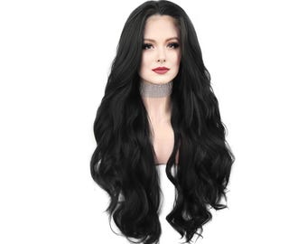 May include: A long, wavy black wig with a natural-looking hairline. The wig is styled with voluminous curls and is displayed on a mannequin head. The model is wearing a rhinestone choker and red lipstick.