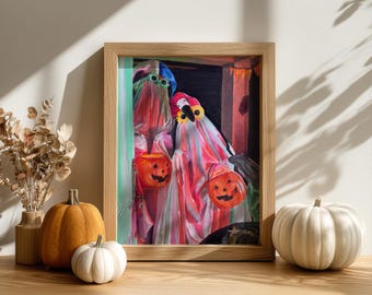 Pode incluir: Uma obra de arte emoldurada retrata duas figuras em fantasias de fantasmas segurando baldes de abóbora. A obra de arte está em uma moldura de madeira e é exibida em uma superfície de madeira com abóboras e flores secas. Os trajes são rosa, vermelho e branco.