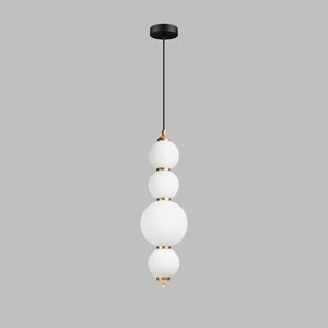 May include: A modern pendant light with a black ceiling mount and a black cord. The light fixture features four white, spherical glass shades of varying sizes, accented with gold-colored metal rings and end caps. The design is minimalist and elegant.