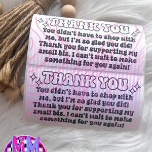 May include: Two rectangular stickers with the words "THANK YOU" in a bubble font. The stickers have a pink and white striped background with text thanking customers for supporting a small business. A logo is visible at the bottom.