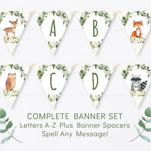 May include: A set of triangle-shaped banner flags with woodland animal illustrations and letters A through D. The flags are white with green foliage and gold glitter accents. The text "COMPLETE BANNER SET Letters A-Z Plus Banner Spacers Spell Any Message!" is printed below the flags.