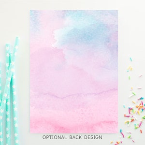 May include: A watercolor design with a pink and blue gradient, with the text "OPTIONAL BACK DESIGN".  Also, there are several light blue paper straws with white star patterns and a scattering of colorful sprinkles.