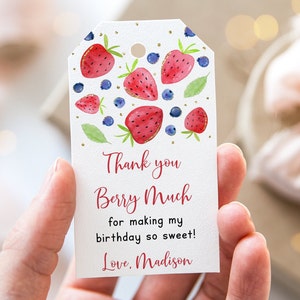 May include: White thank you tag with red and blue watercolor strawberries and blueberries. The tag says "Thank you Berry Much for making my birthday so sweet! Love, Madison."