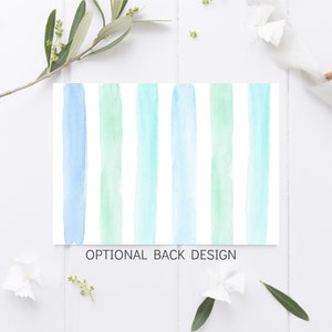 May include: A watercolor background design with alternating blue and green stripes. The text "OPTIONAL BACK DESIGN" is printed at the bottom of the design.