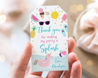 May include: A white thank you tag with a blue and turquoise border. The tag features a unicorn riding a pink inflatable ring, a beach ball, a pineapple, sunglasses, watermelon, ice cream cones, popsicles, and flip flops. The text on the tag reads "Thank you for making my party a Splash Love, Madison".