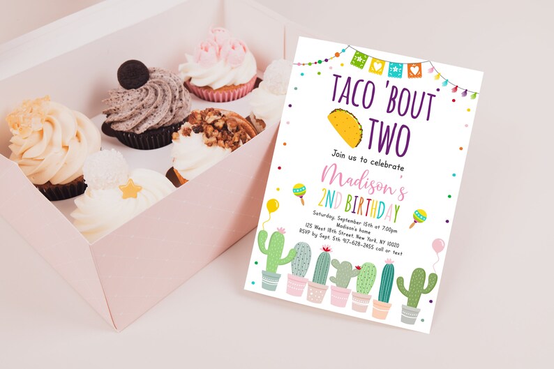 May include: A colorful invitation for a 2nd birthday party with a taco theme. The invitation says "Taco 'Bout Two" and features a cartoon taco, cactus plants, and maracas. The text includes the birthday girl's name, date, time, and location.