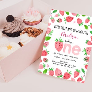 May include: A pink and white birthday invitation with a watercolor strawberry pattern. The invitation says "Berry Sweet and So Much Fun" and "Madison is turning one".