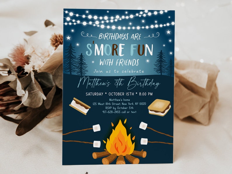 May include: A dark blue birthday invitation with the text "BIRTHDAYS ARE S'MORE FUN WITH FRIENDS." The invitation includes a campfire graphic, marshmallows, and a s'more. The details include the date, time, and location of the party.