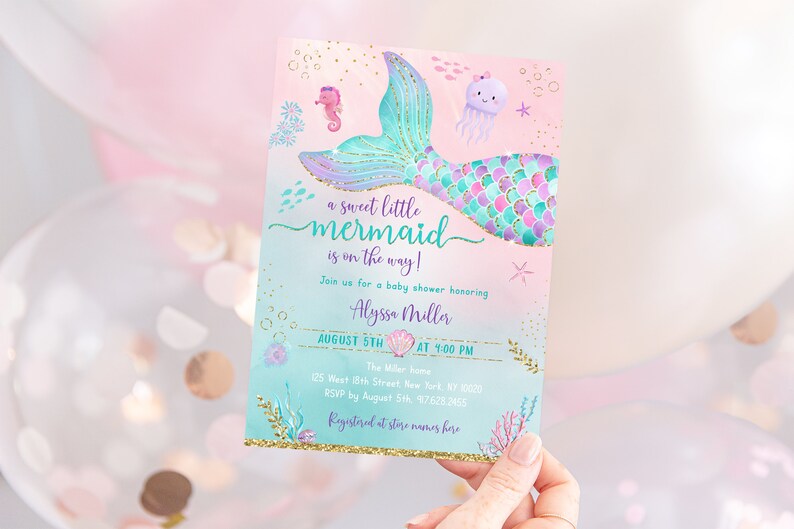 May include: A baby shower invitation with a mermaid tail design. The invitation is pink and blue with gold glitter accents. The text reads "a sweet little mermaid is on the way!" and includes the date, time, and location of the shower.