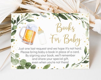 May include: A white card with green leaves and gold glitter. The text "Books For Baby" is written in gold. The card says "Just one last request and we hope it's not hard. Please bring baby a book in place of a card. By signing your book, we'll remember and share your special gift, even when you're not there!"