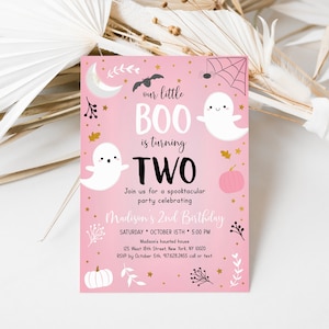 May include: Pink Halloween birthday invitation with a ghost and pumpkin illustration. The text reads "our little BOO is turning TWO. Join us for a spooktacular party celebrating Madison's 2nd Birthday. Saturday, October 15th, 5:00 PM. Madison's haunted house, 125 West 18th Street, New York, NY 10020. RSVP by October 5th, 97.628.2455 call or text."