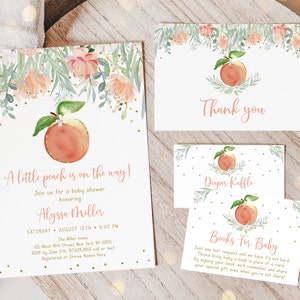 May include: A peach-themed baby shower invitation with gold glitter accents. The invitation features a peach with a green leaf, watercolor flowers, and the text "A little peach is on the way!"  Join us for a baby shower honoring Alyssa Miller. Saturday, August 15th, 6:00 PM. The Miller home, 125 West 18th Street New York, NY 10020. RSVP by June 5th, 97628.2455 call or text. Registered at Stores Names Here.