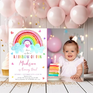 May include: Rainbow-themed first birthday party invitation with a photo of a baby girl. The invitation features a colorful rainbow with clouds and gold glitter. The text reads "Join us for a Rainbow of Fun Madison is turning One!" with the date and time of the party.