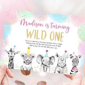 May include: A pink, blue, and green invitation with gold glitter confetti. The invitation says "Madison is turning WILD ONE". It also includes the text "Join us to celebrate on Saturday, September 15th at 7:00pm Madison's home, 125 West 18th Street New York, NY 10020 RSVP by Sept. 5th 97-628-2455 call or text". The invitation features a cartoon giraffe, lion, elephant, rhinoceros, and zebra wearing party hats.