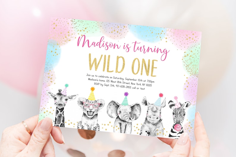 May include: A pink, blue, and green invitation with gold glitter confetti. The invitation says "Madison is turning WILD ONE". It also includes the text "Join us to celebrate on Saturday, September 15th at 7:00pm Madison's home, 125 West 18th Street New York, NY 10020 RSVP by Sept. 5th 97-628-2455 call or text". The invitation features a cartoon giraffe, lion, elephant, rhinoceros, and zebra wearing party hats.