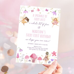 May include: A fairy-themed birthday invitation with the text "A sprinkle of fairy dust, a whole lot of fun, it's Madison's Fairy First Birthday." The invitation features illustrations of fairies, flowers, and mushrooms. The date and time are included.