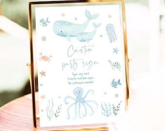 May include: A framed custom party sign with an ocean theme. The sign features watercolor illustrations of whales, an octopus, a jellyfish, and other sea creatures in shades of blue and peach. Text on the sign reads "Custom party sign".