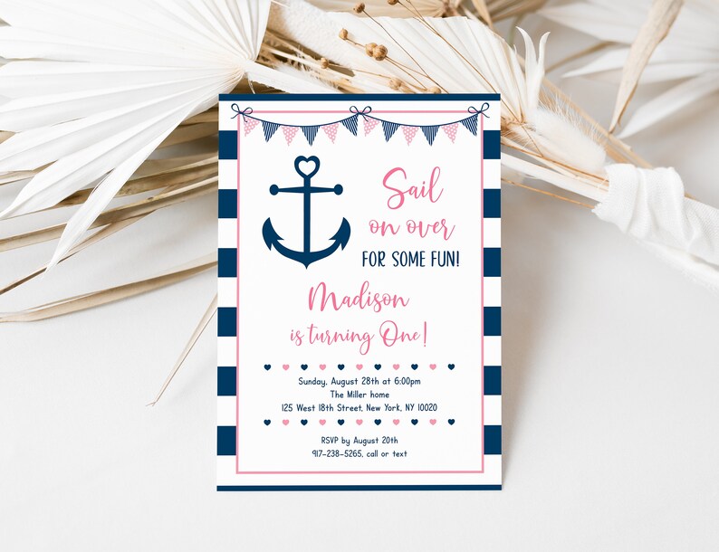 May include: A nautical-themed birthday party invitation with a blue and white striped background. The invitation features a pink anchor with a heart in the center and the text "Sail on over for some fun!"  The invitation is for Madison's first birthday party.