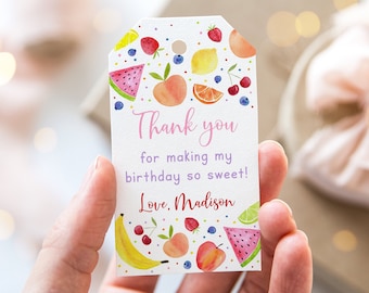 May include: A white thank you tag with a colorful fruit design. The tag says "Thank you for making my birthday so sweet! Love, Madison".