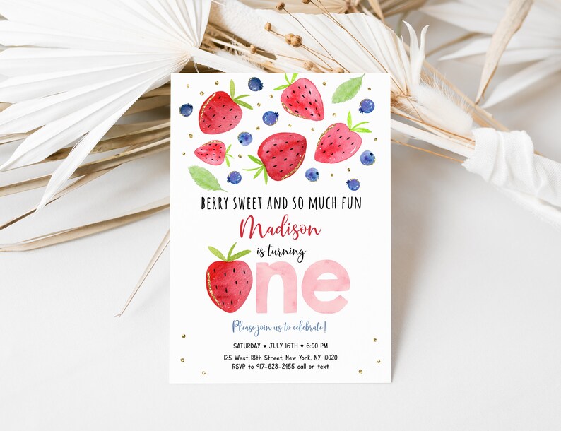 May include: A pink and white birthday invitation with a watercolor illustration of strawberries and blueberries. The text reads "Berry Sweet and So Much Fun Madison is turning one. Please join us to celebrate! Saturday, July 16th, 6:00 PM 125 West 18th Street, New York, NY 10020 RSVP to 917-628-2455 call or text"