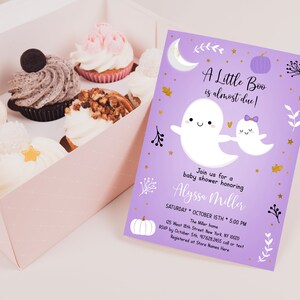 May include: Purple baby shower invitation with a ghost and pumpkin design. The text reads "A Little Boo is almost due!" and includes the date, time, and location of the event. RSVP information is also included.