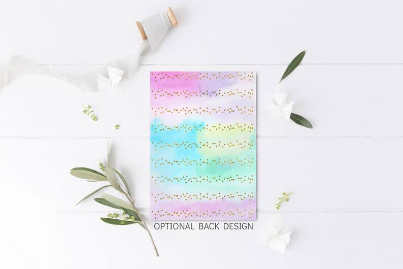 May include: A watercolor background with a rainbow gradient of pink, purple, blue, and green. The background is decorated with gold glitter dots.
