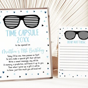 May include: A printable time capsule for an 18th birthday. The design features a pair of black sunglasses with a blue and white confetti background. The text reads "Time Capsule 20XX to be opened on Matthew's 18th Birthday".