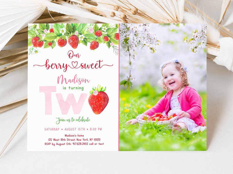 May include: A birthday invitation with a watercolor strawberry theme. The text reads "Our berry sweet Madison is turning Two." A photo of a smiling child holding a basket of strawberries is on the right.
