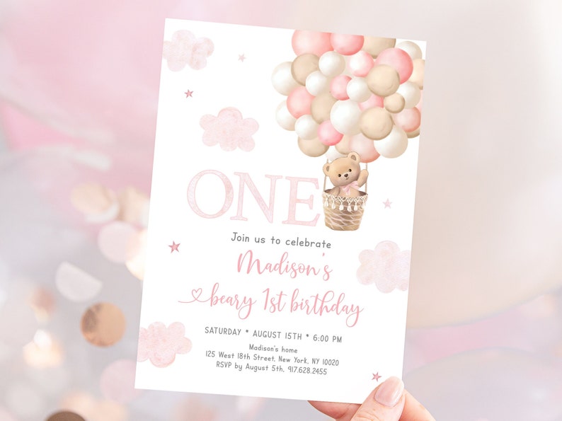 May include: Pink and beige watercolor invitation with a teddy bear in a hot air balloon made of balloons. The invitation says "ONE" and "Join us to celebrate Madison's beary 1st birthday".