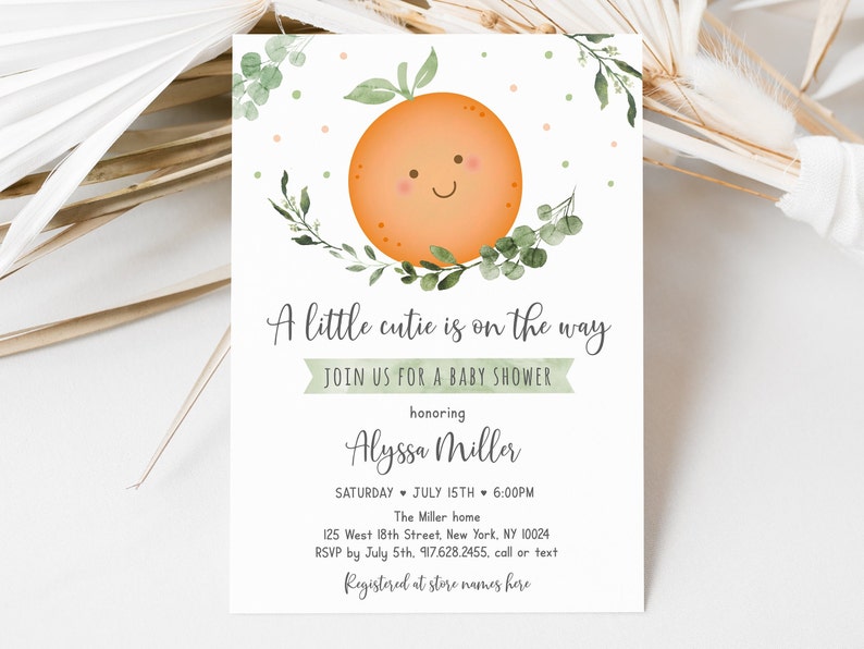 May include: A baby shower invitation with a cute orange illustration and green leaves. The text reads "A little cutie is on the way. Join us for a baby shower honoring Alyssa Miller. Saturday, July 15th, 6:00 PM. The Miller home. 125 West 18th Street, New York, NY 10024. RSVP by July 5th, 917.628.2455, call or text. Registered at store names here."