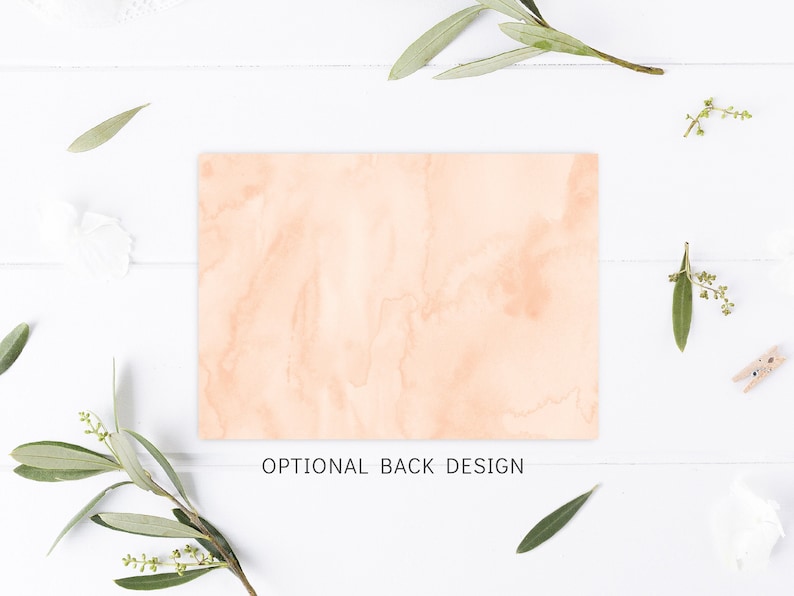 May include: A peach-colored card with a watercolor background. The card has the text "OPTIONAL BACK DESIGN" printed on it.