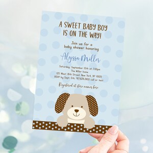May include: A blue and brown baby shower invitation with white polka dots. The invitation says "A Sweet Baby Boy Is On The Way!" and includes the text "Join us for a baby shower honouring Alyssa Miller".