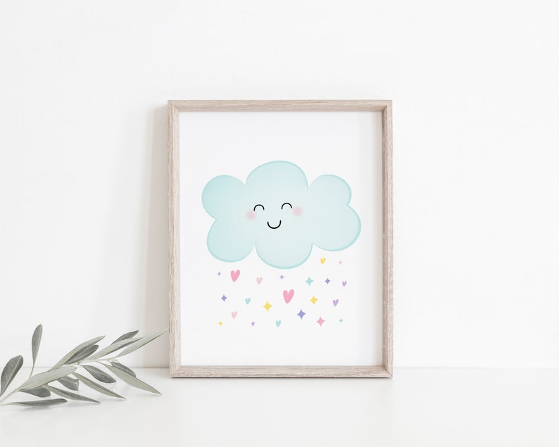 Puede incluir: Una impresi&oacute;n enmarcada de una nube de dibujos animados azul claro con una cara sonriente y mejillas rosadas. La nube est&aacute; lloviendo corazones y estrellas de colores.