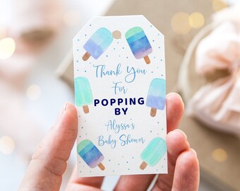 May include: White thank you tag with blue and green watercolor popsicle illustrations. The text reads "Thank You For Popping By Alyssa's Baby Shower".