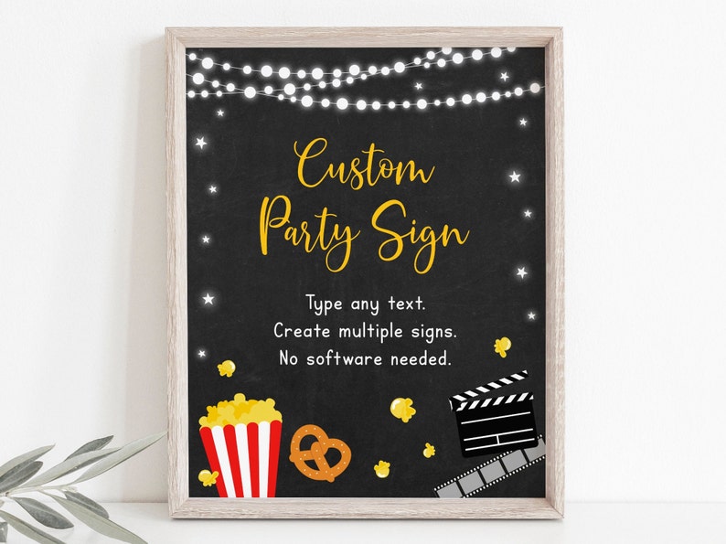 May include: A framed black sign with the text "Custom Party Sign" in gold script. The sign includes illustrations of popcorn, a pretzel, and a film clapper. The sign also has text that says "Type any text. Create multiple signs. No software needed."