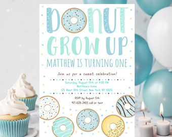 May include: A birthday party invitation with a donut theme. The invitation reads "DONUT GROW UP" and "MATTHEW IS TURNING ONE." The design includes illustrations of donuts and is decorated with blue and yellow accents. Cupcakes and balloons are in the background.