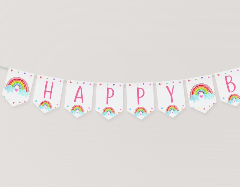 May include: A white banner with pink letters spelling "HAPPY" and a "B" at the end. Each letter has a rainbow and cloud design with a heart in the cloud.