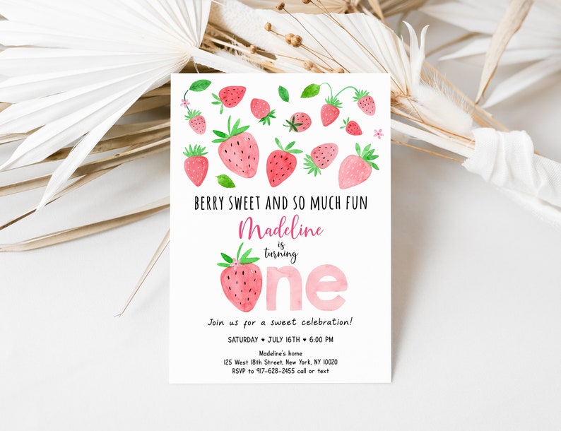 May include: A pink and white birthday invitation with a watercolor illustration of strawberries. The text reads "Berry Sweet and So Much Fun Madeline is turning one. Join us for a sweet celebration! Saturday, July 16th, 6:00 PM. Madeline's home, 125 West 18th Street, New York, NY 10020. RSVP to 917-628-2455 call or text."