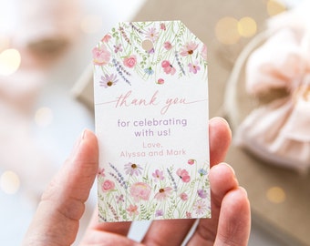 May include: A white thank you tag with a watercolor floral design in shades of pink, purple, and green. The text reads "Thank you for celebrating with us! Love, Alyssa and Mark."