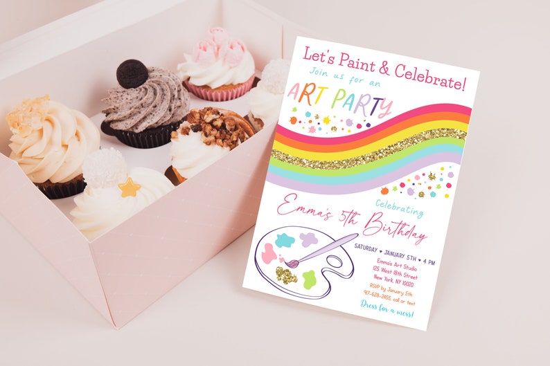 May include: A colorful invitation for an art party celebrating a child's 5th birthday. The invitation features a rainbow with gold glitter, a paint palette, and a paintbrush. The text on the invitation reads "Let's Paint & Celebrate!" and "Emma's 5th Birthday".